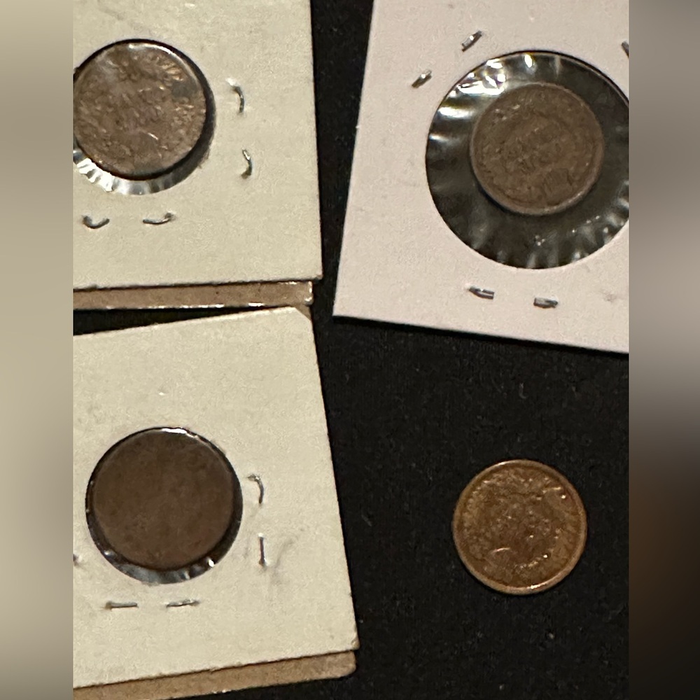 4 Indian Head pennies 1887, 1902, 1906, and 1907